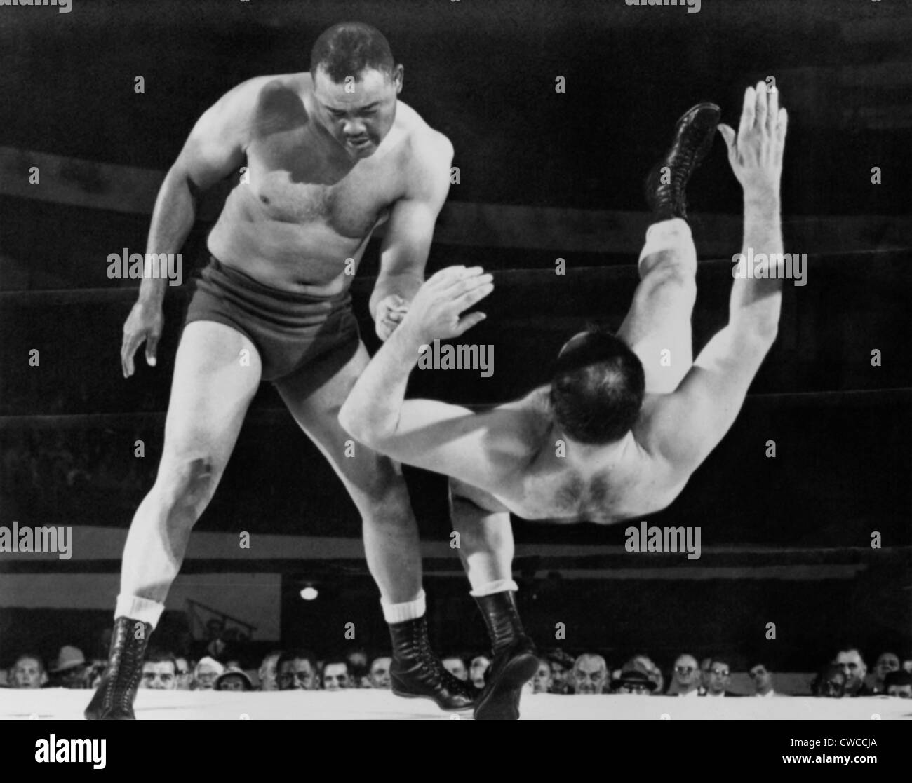 joe-louis-throws-jim-bernard-to-the-mat-during-a-1956-wrestling-match-CWCCJA.jpg
