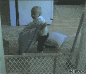 Smart-kid-escapes-baby-gate-pillow.gif