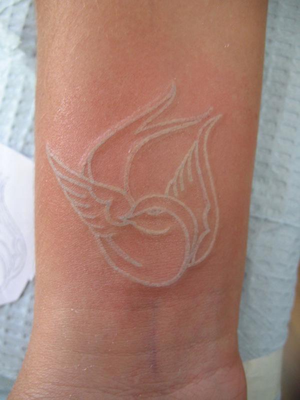 17-White-ink-Bird-tattoo.jpg